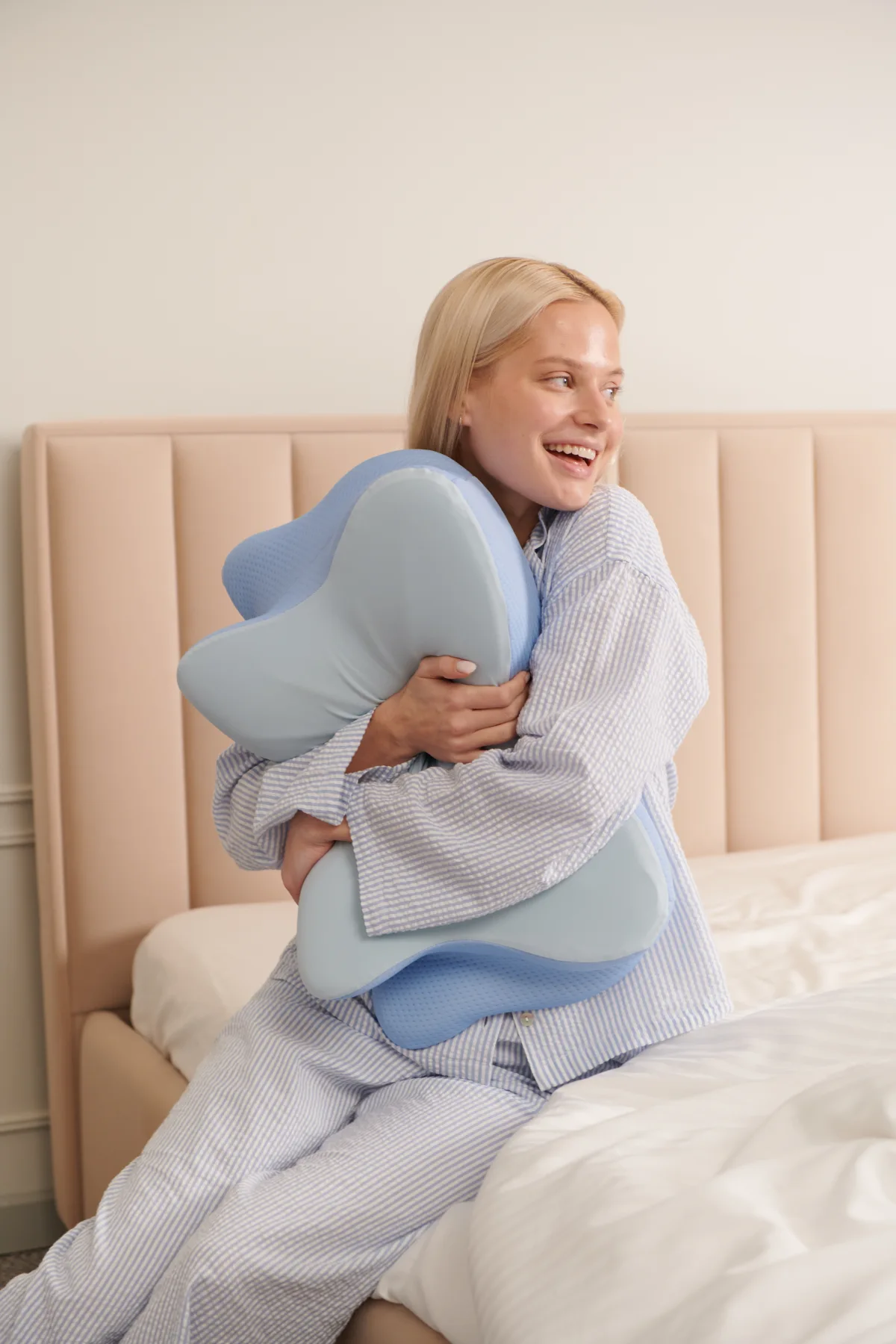 Derila Ergo pillow shown in a natural bedroom home environment