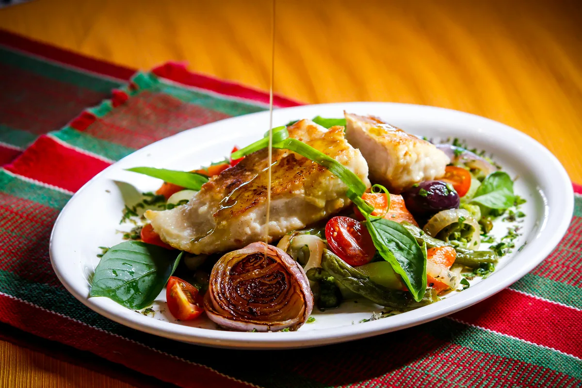 Mediterranean style meal with whole grains, vegetables, olive oil, fish and legumes
